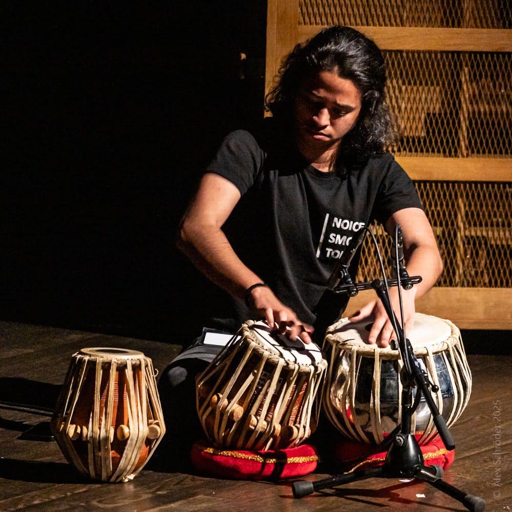 Dhruv Sharma performing on tabla