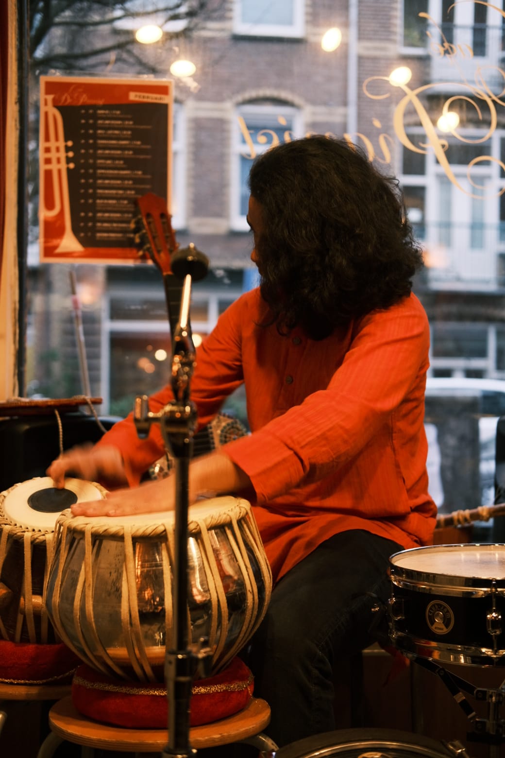 Dhruv Sharma playing tabla, close up